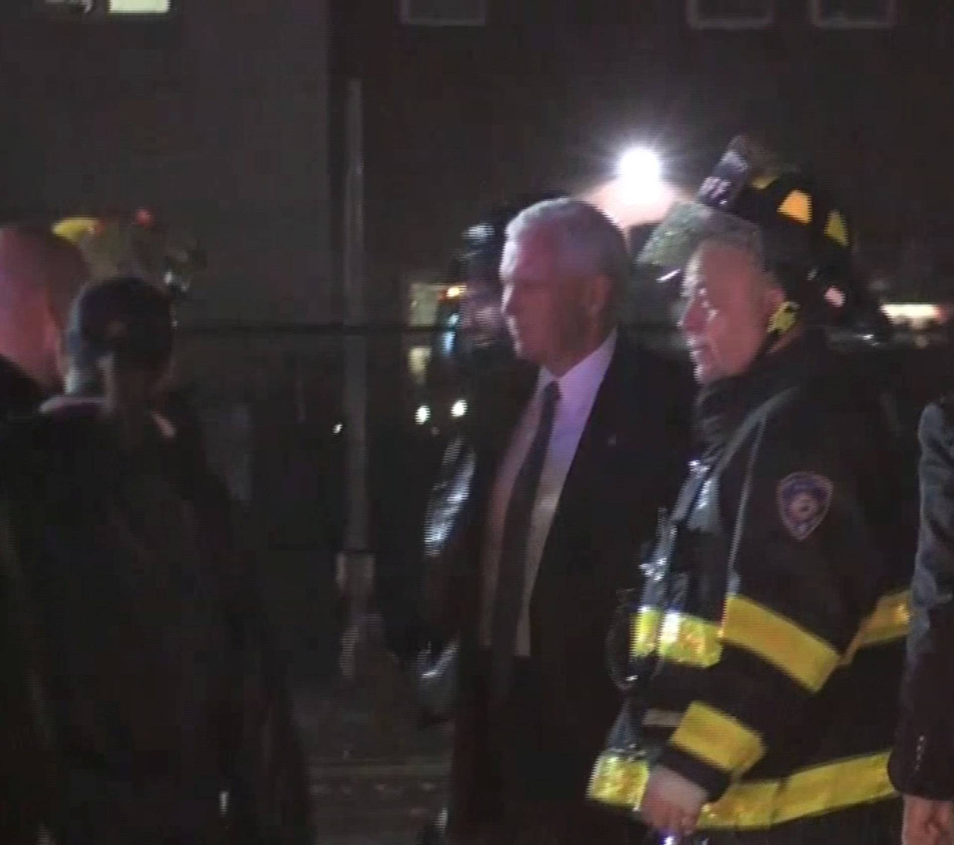 Still image of U.S. Republican vice presidential nominee Pence on the tarmac after a plane carrying him skidded off the runway after landing in the rain at New York City's LaGuardia Airport