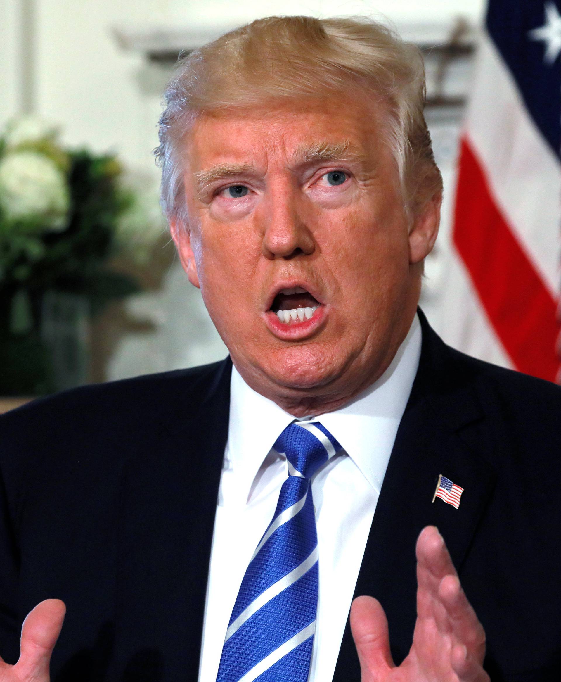 U.S. President Trump speaks to reporters about North Korea at his golf estate in Bedminster, New Jersey