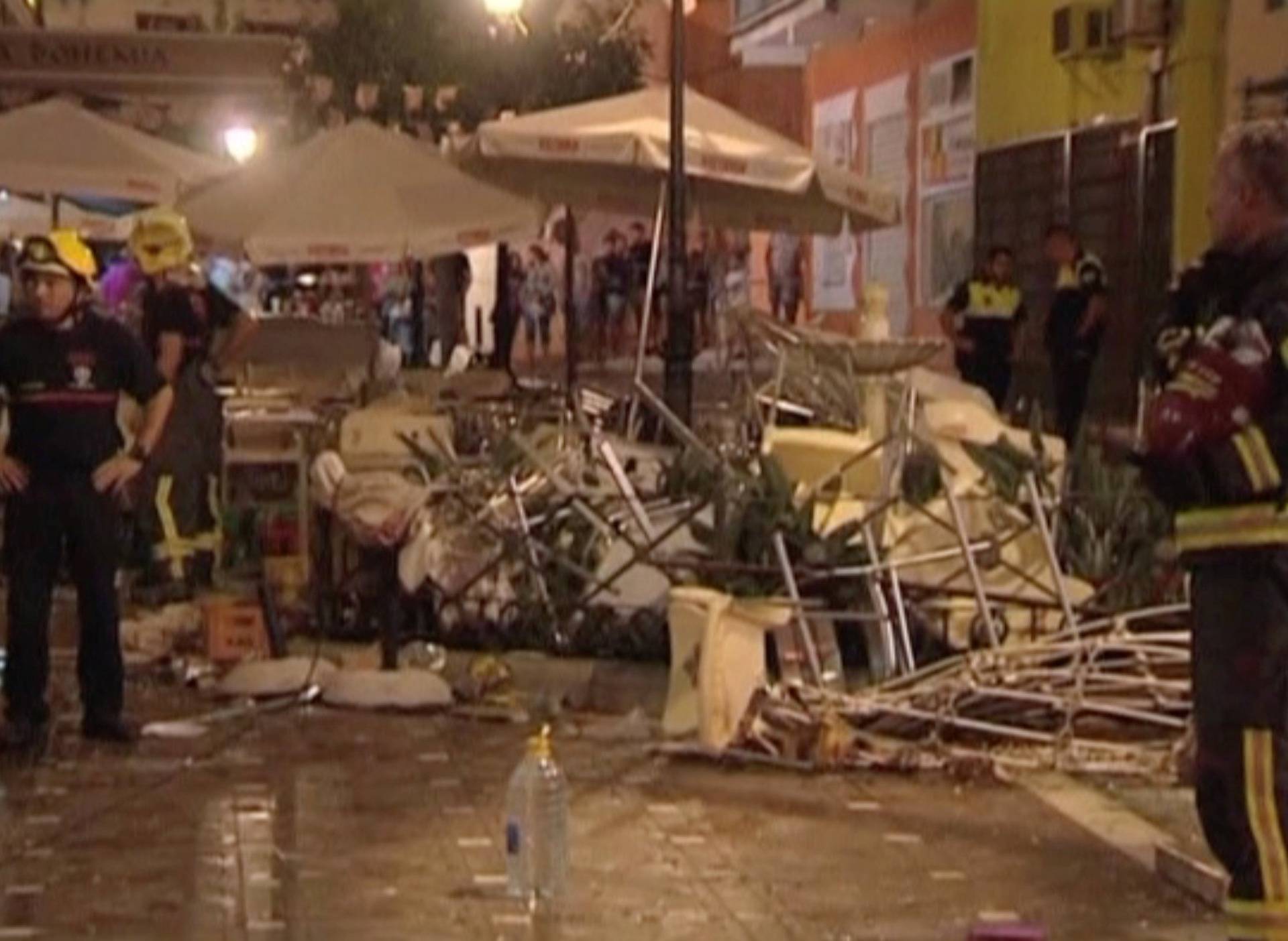 Police and rescue services are pictured at the scene after a gas cylinder exploded in a cafe in Velez-Malaga