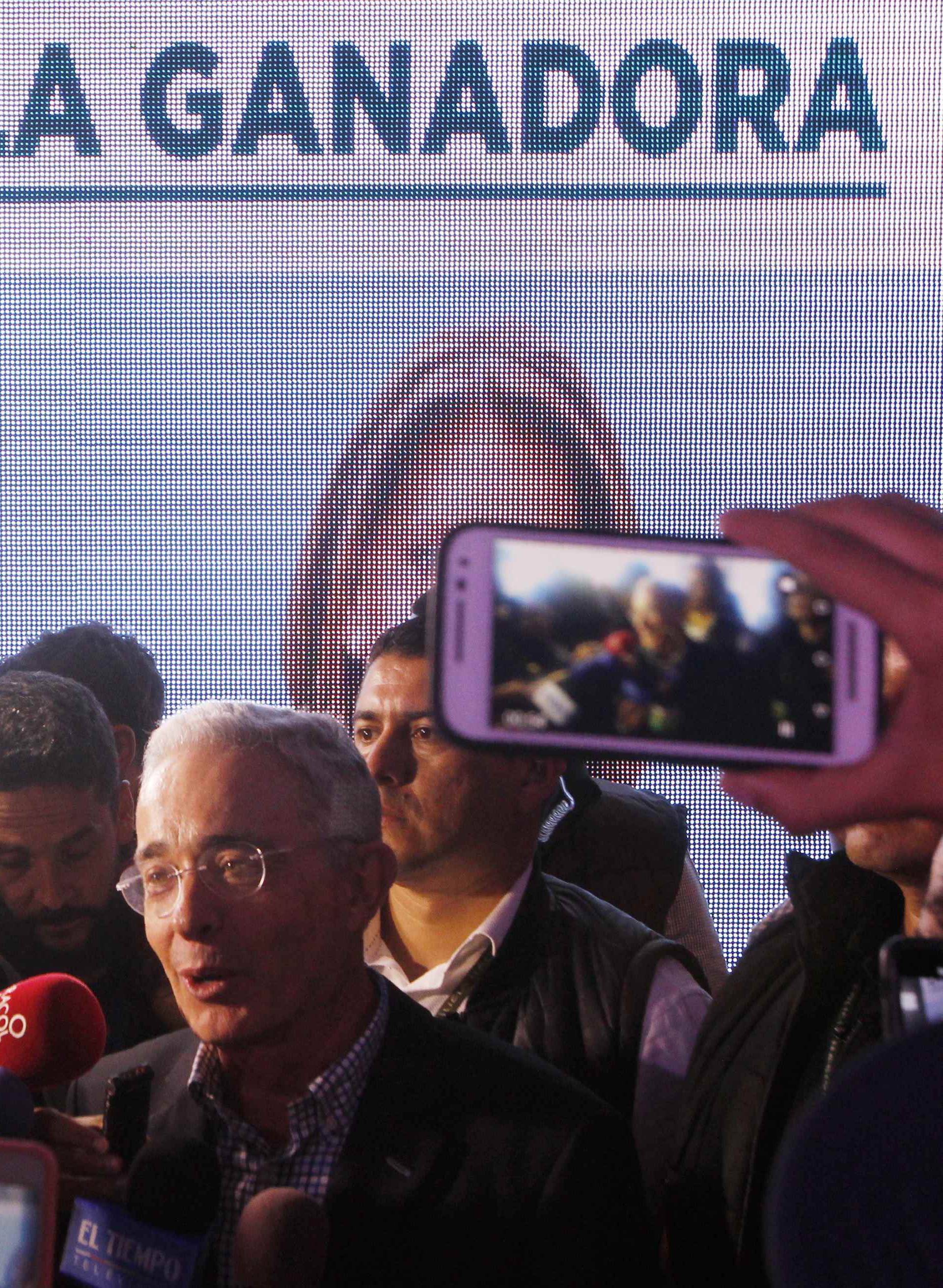 Former Colombian President Uribe speaks to members of the media after right wing candidate Duque won the presidential election in Medellin Colombia