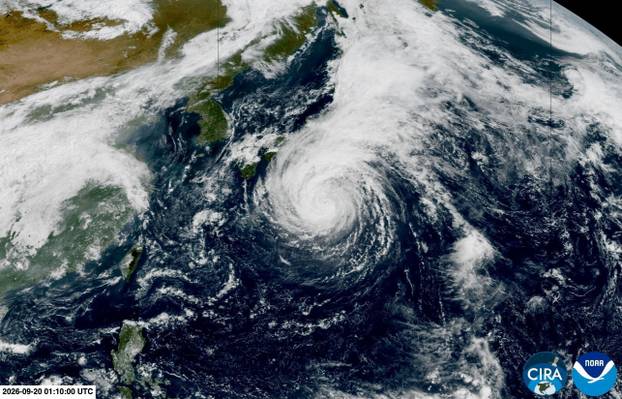 A satellite view shows a typhoon Dujuan approaching Japan
