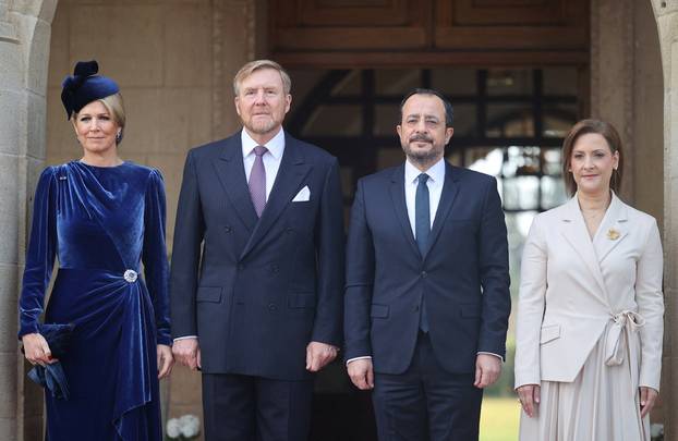 Cyprus' President Nikos Christodoulides, his wife Philippa Karsera Christodoulides, Dutch King Willem-Alexander and Queen Maxima pose for a picture during a welcome ceremony at the Presidential Palace in Nicosia