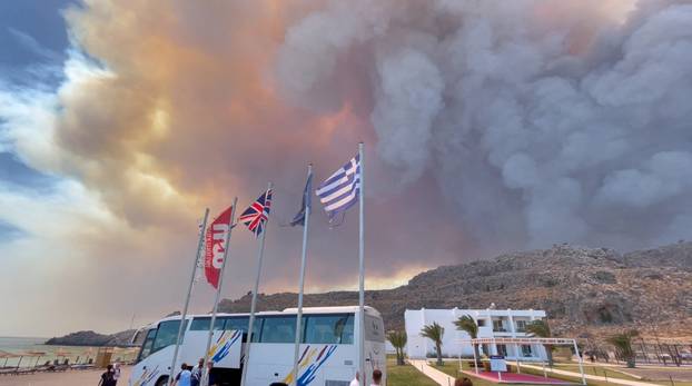 Smoke rises from a wildfire in Rhodes Island