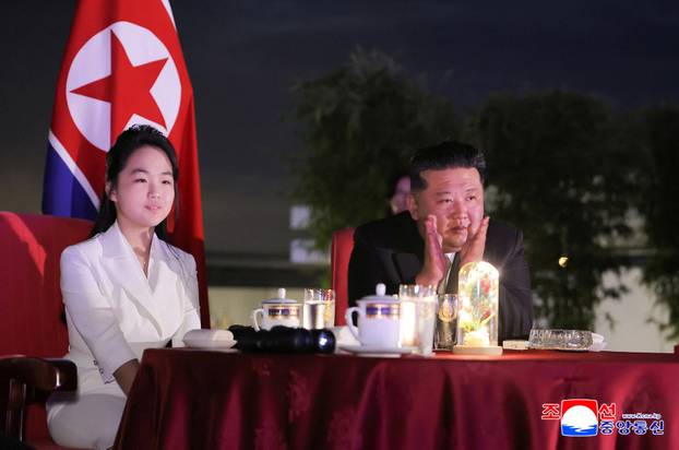 North Korean leader Kim Jong Un and his daughter Kim Ju Ae attend a ceremony to celebrate the completion of the Wonsan Kalma Coastal Tourist Zone