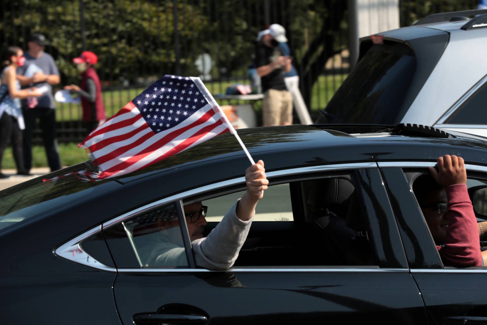 Supporters rally in support of U.S. President Donald Trump outside of the Walter Reed National Military Medical Center  in Bethesda