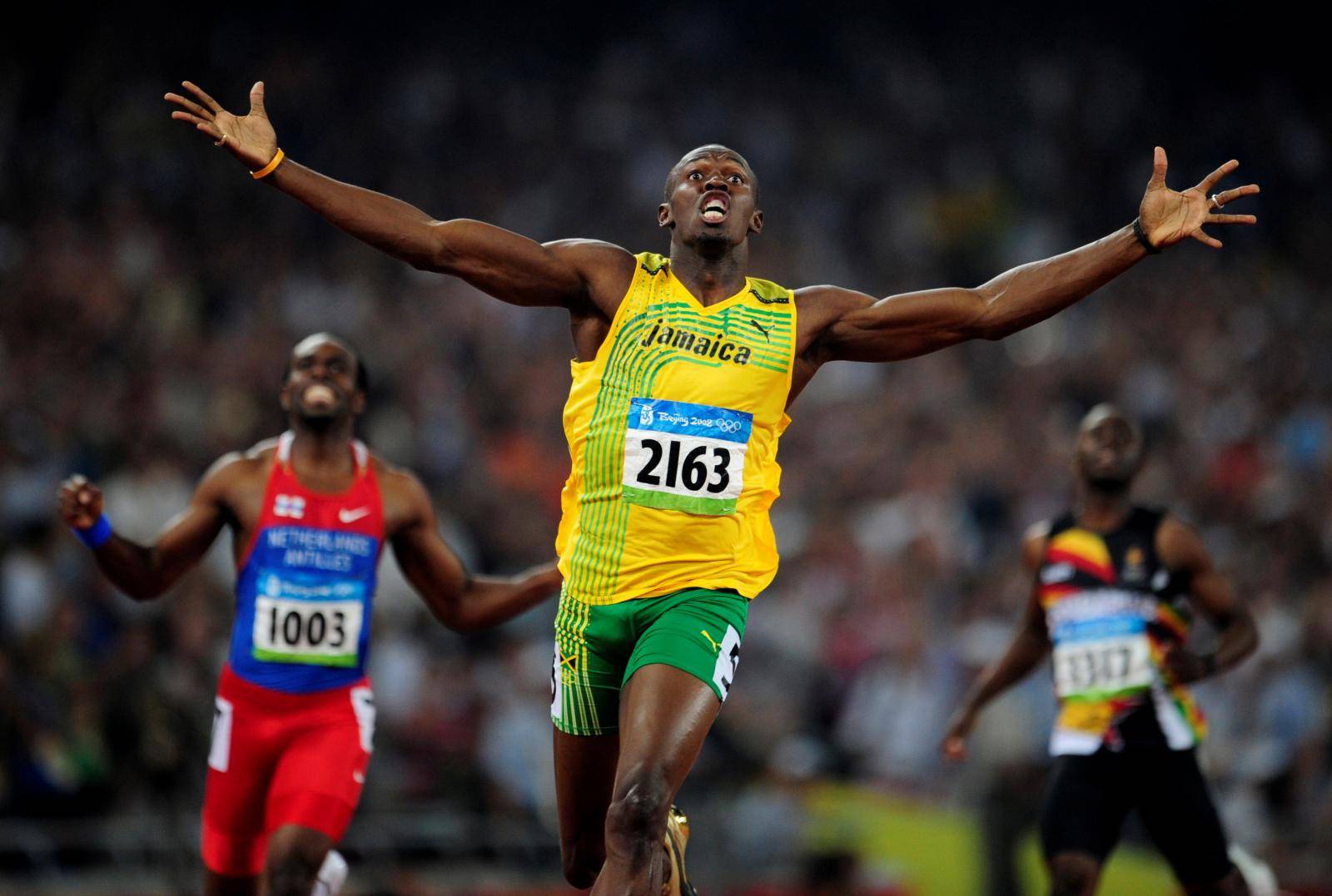 FILE PHOTO: Usain Bolt of Jamaica celebrates winning men's 200m final at Beijing 2008 Olympic Games