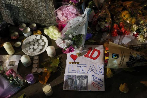 Fans gather and place tributes to former One Direction singer Liam Payne, in Wolverhampton