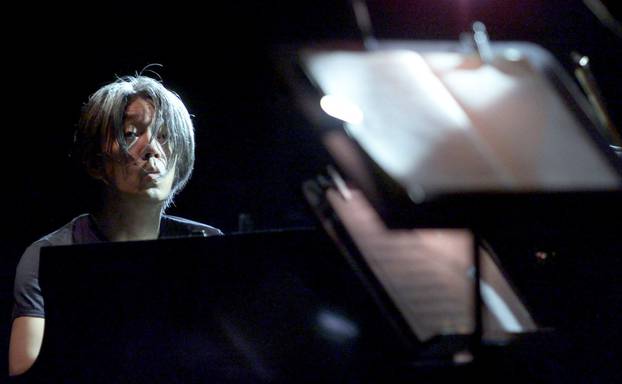 FILE PHOTO: JAPANESE MUSICIAN RYUICHI SAKAMOTO PERFORMS IN ROME'S VILLA CELIMONTANA PARK.