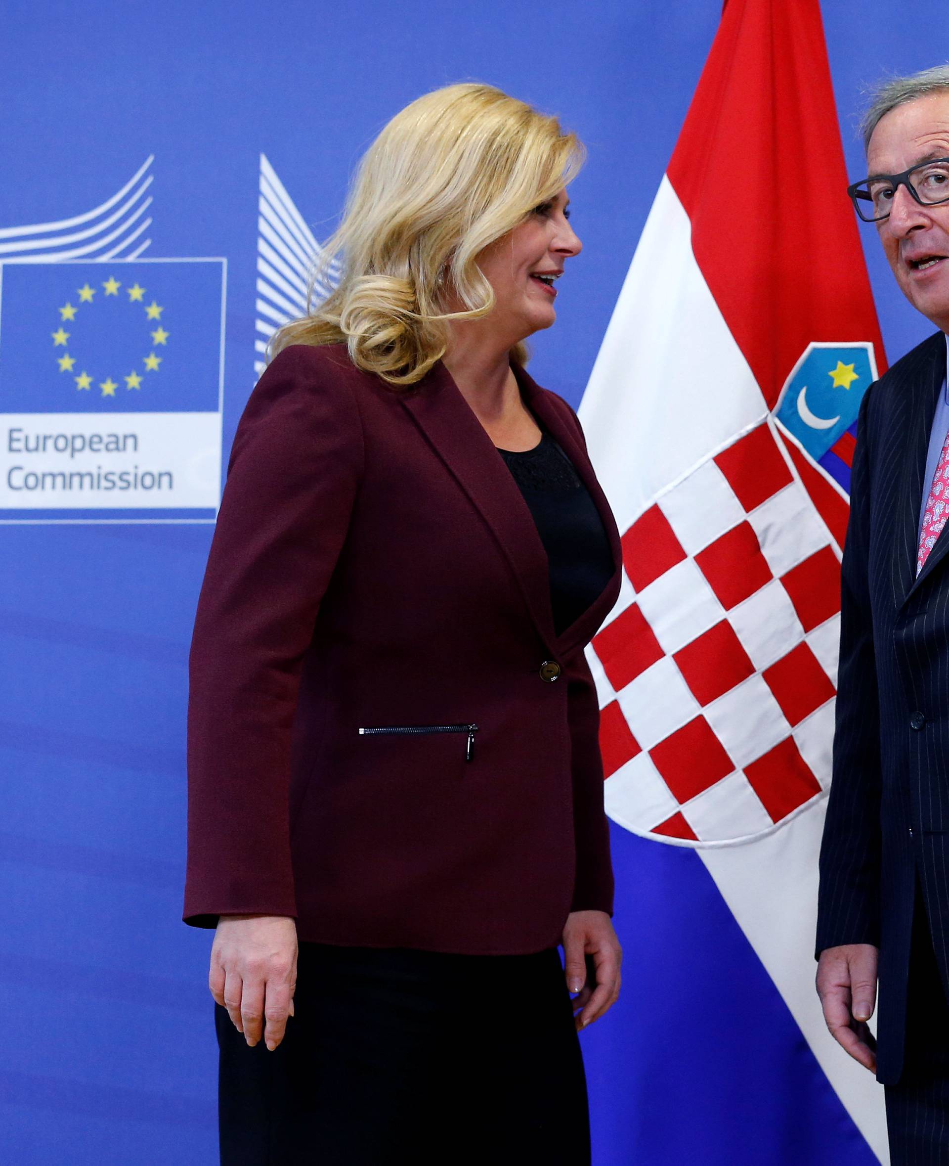 EU Commission President Juncker poses with Croatia's President Grabar-Kitarovic in Brussels