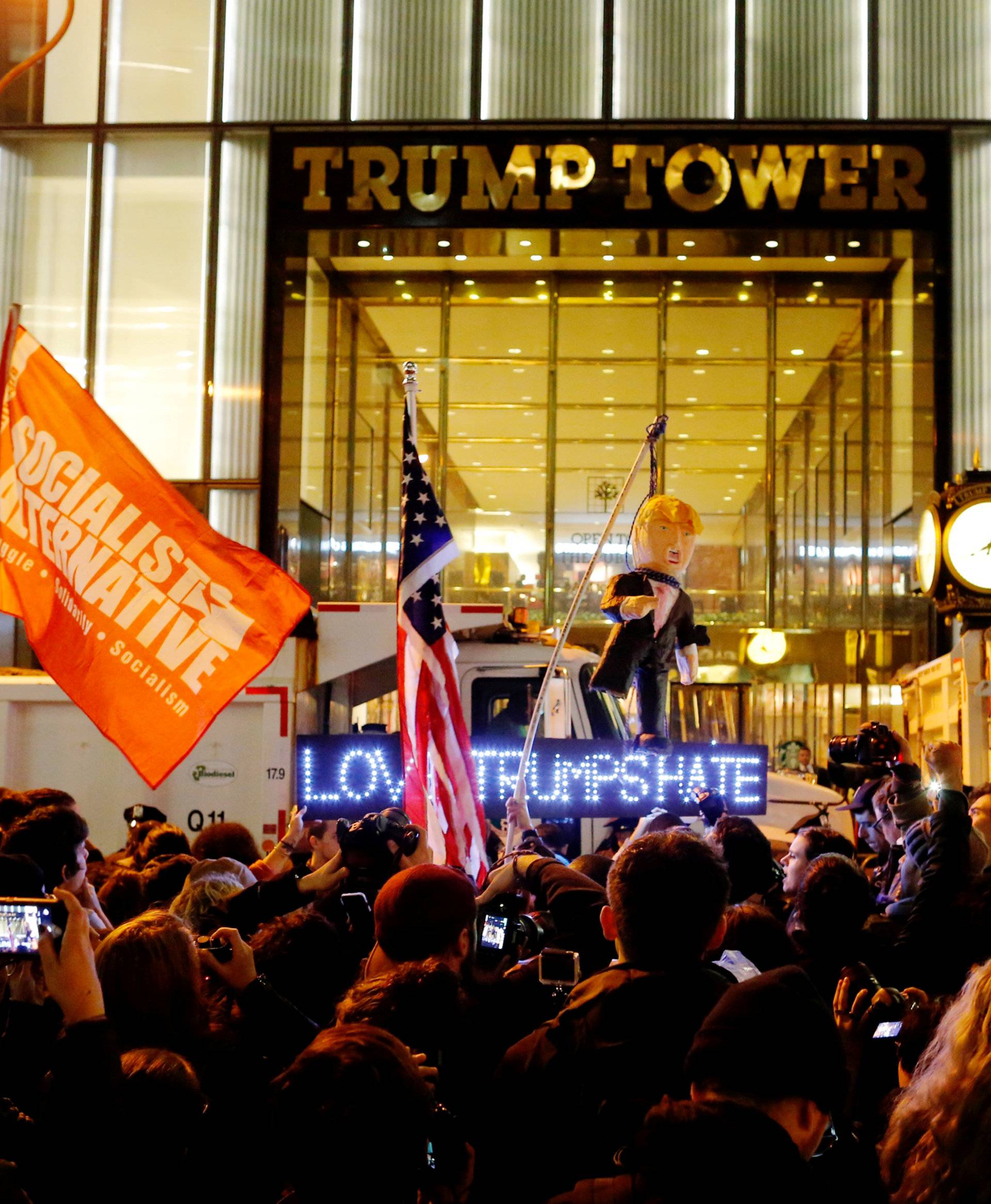 Protesters reach Trump Tower as they march against Republican president-elect Donald Trump in the neighborhood of Manhattan in New York