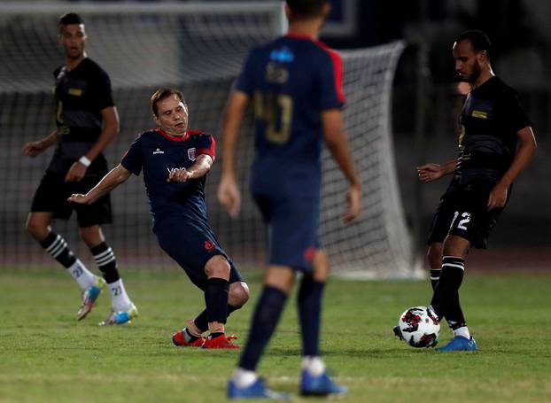 Ezzeldin Bahader, a 74-years-old Egyptian football player of 6th October Club is seen in action during a soccer match against El Ayat Sports Club of Egypt