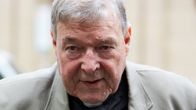 Cardinal George Pell arrives at the County Court in Melbourne, Australia