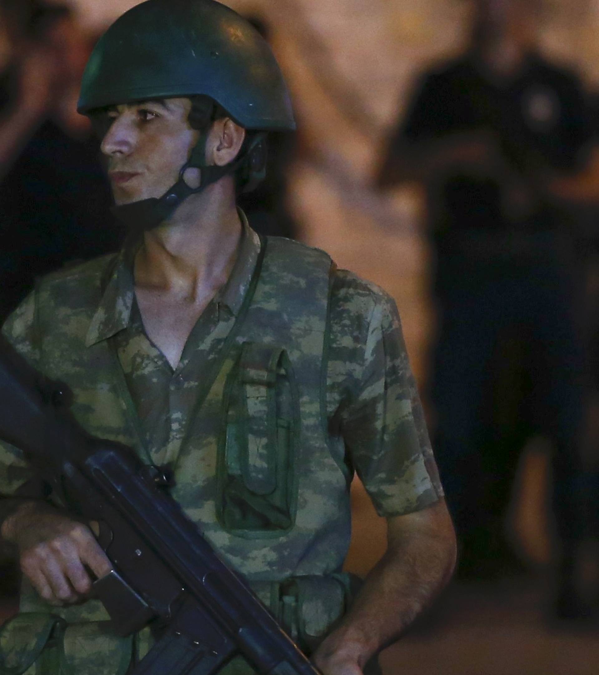 A Turkish military stands guard near the Taksim Square in Istanbul
