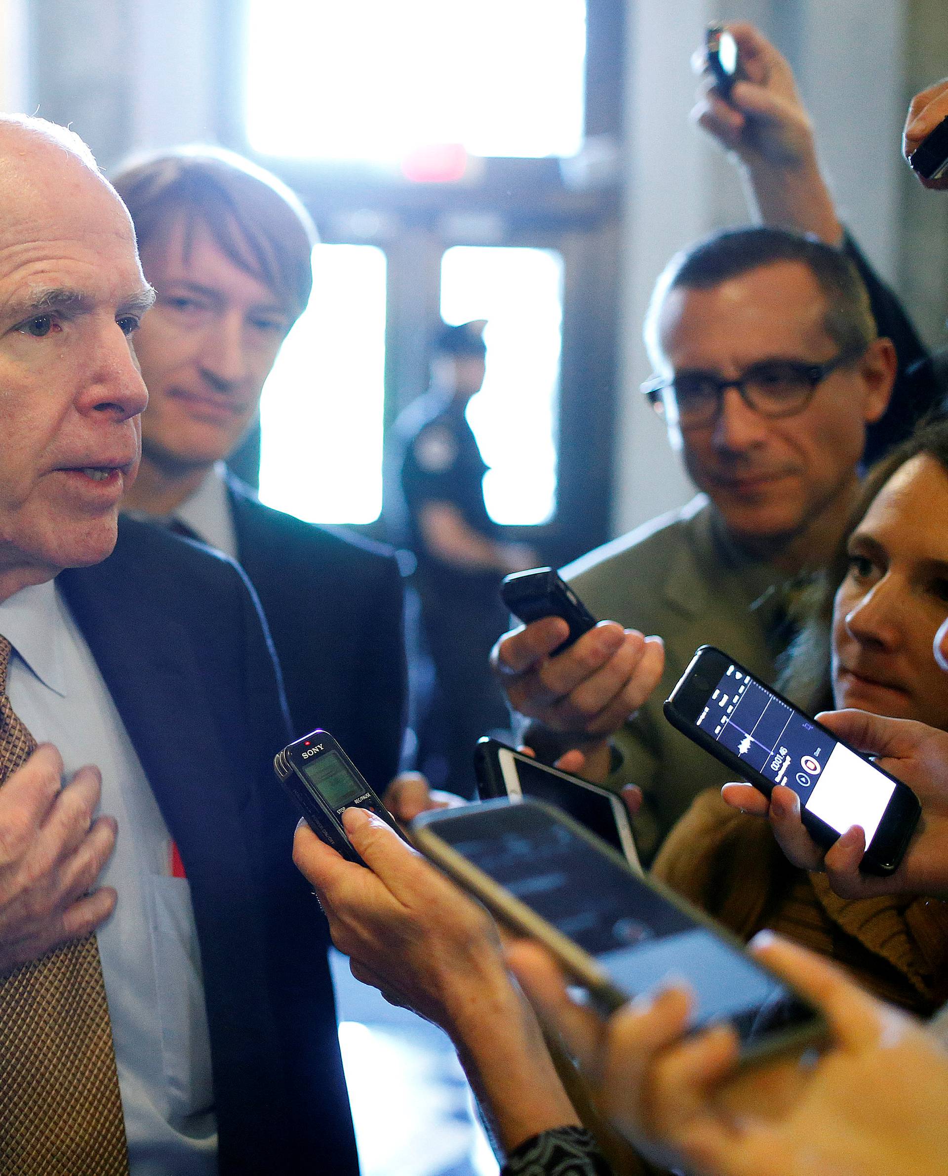 Senator John McCain speaks to reporters at the U.S. Capitol in Washington