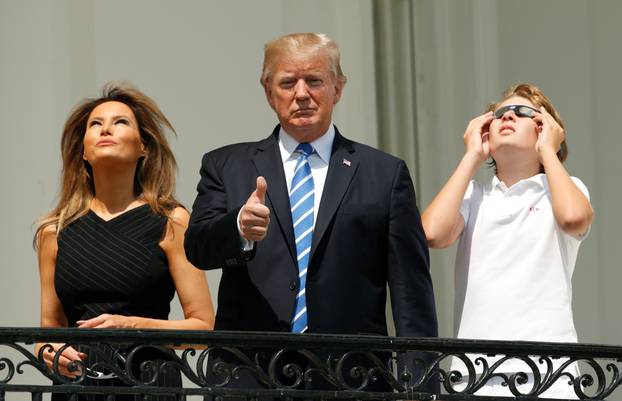 U.S. President Trump and his family watch the solar eclipse from the White House in Washington