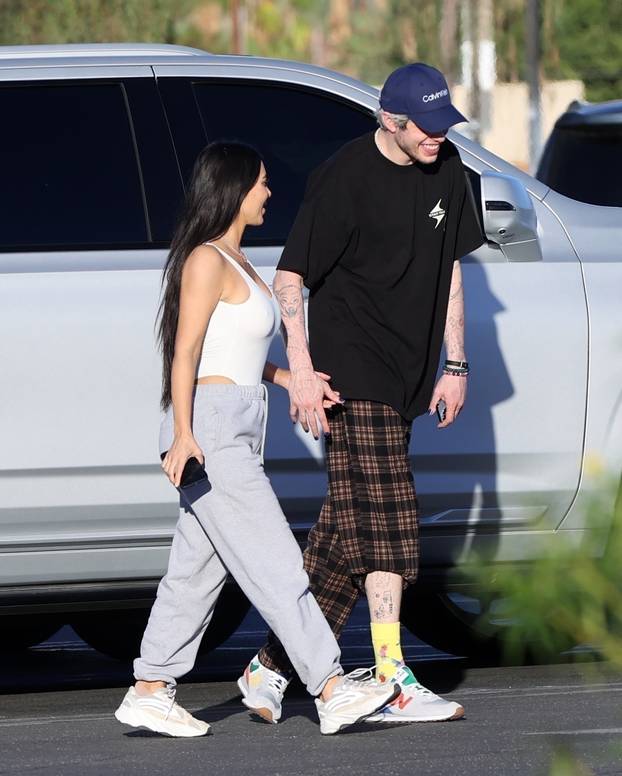*PREMIUM-EXCLUSIVE*  Kim Kardashian and Pete Davidson confirm their relationship holding hands after celebrating Pete
