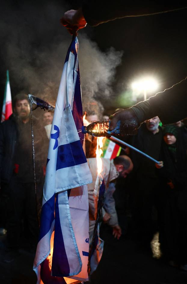 People gather after a two-week ceasefire in the Iran war was announced, in Tehran