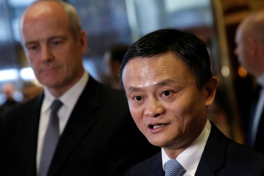 Alibaba executive chairman Jack Ma speaks to reporters after meeting with U.S. President-elect Donald Trump at Trump Tower in New York