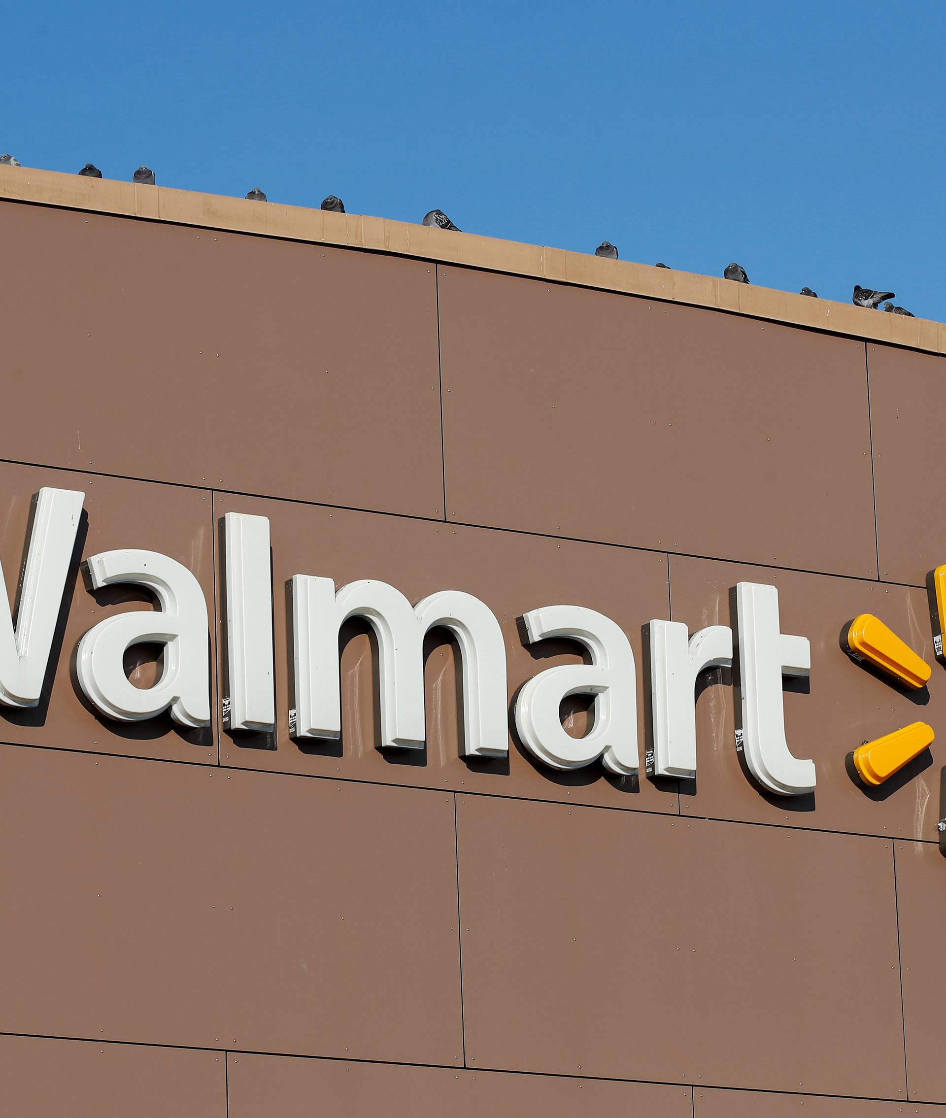 FILE PHOTO: Walmart's logo is seen outside one of the stores in Chicago