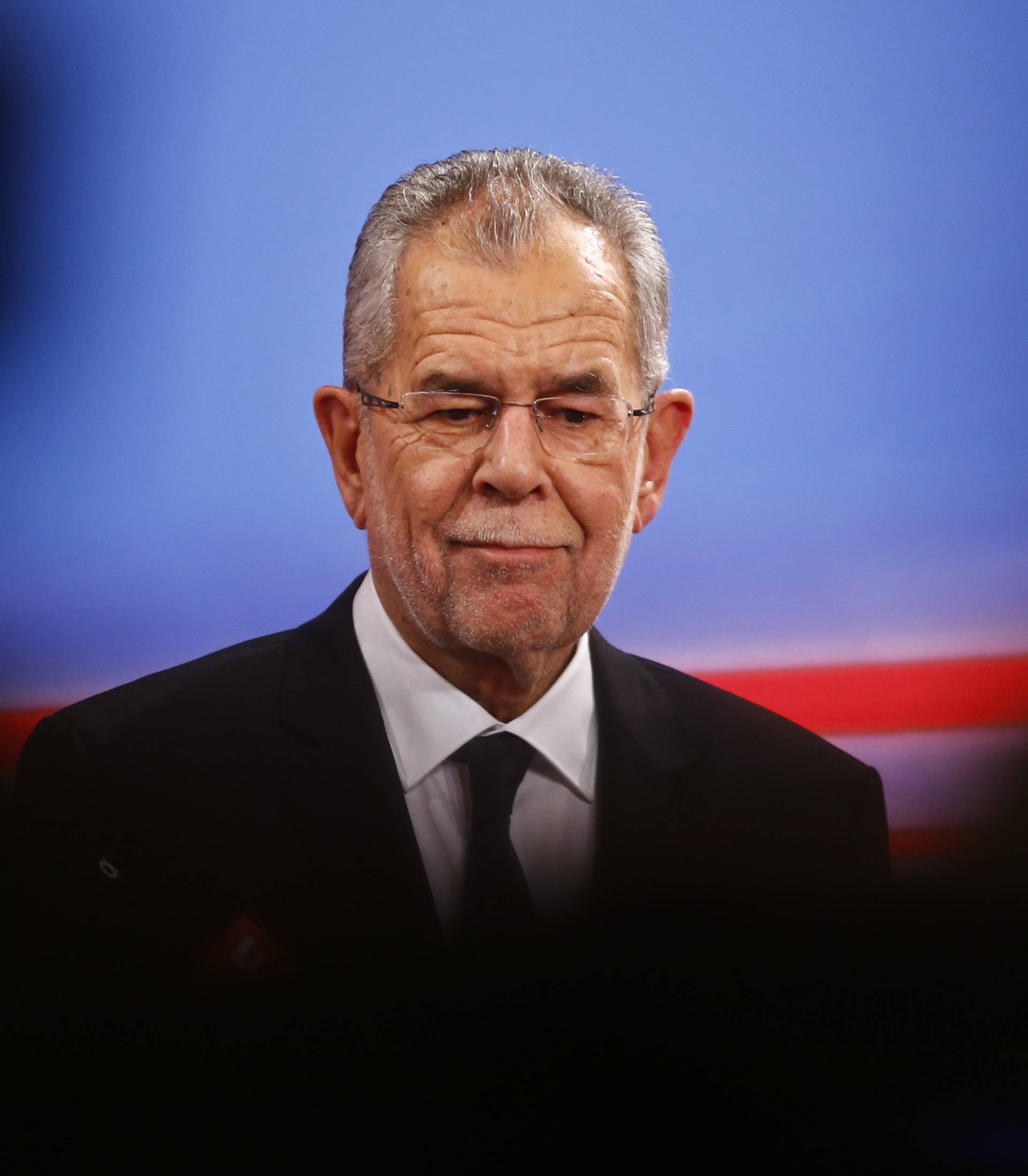 Austrian presidential candidate Van der Bellen , who is supported by the Greens, and reacts during a TV show in Vienna