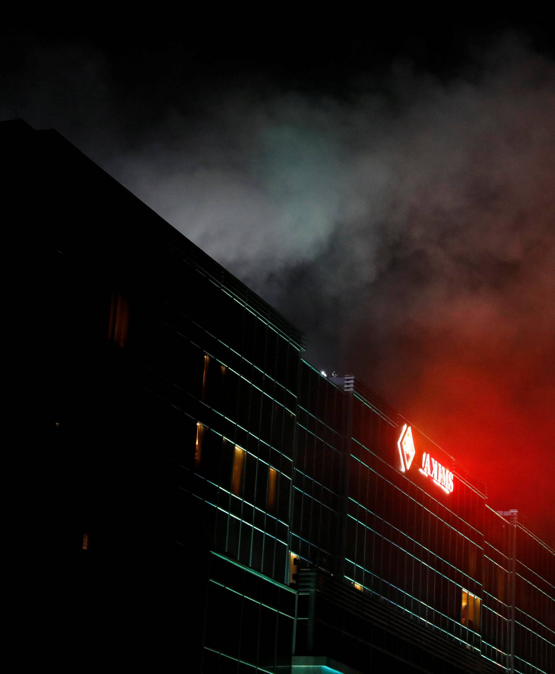 Smoke billows from the Resorts World building in Pasay City, Metro Manila, Philippines