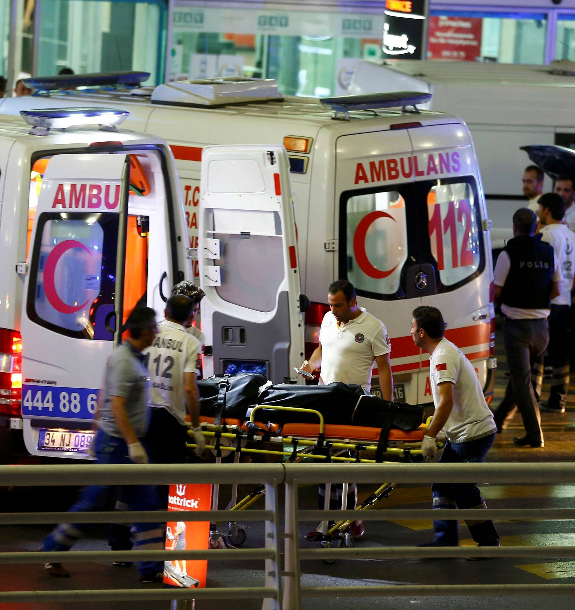 Paramedics push a stretcher at Turkey's largest airport, Istanbul Ataturk