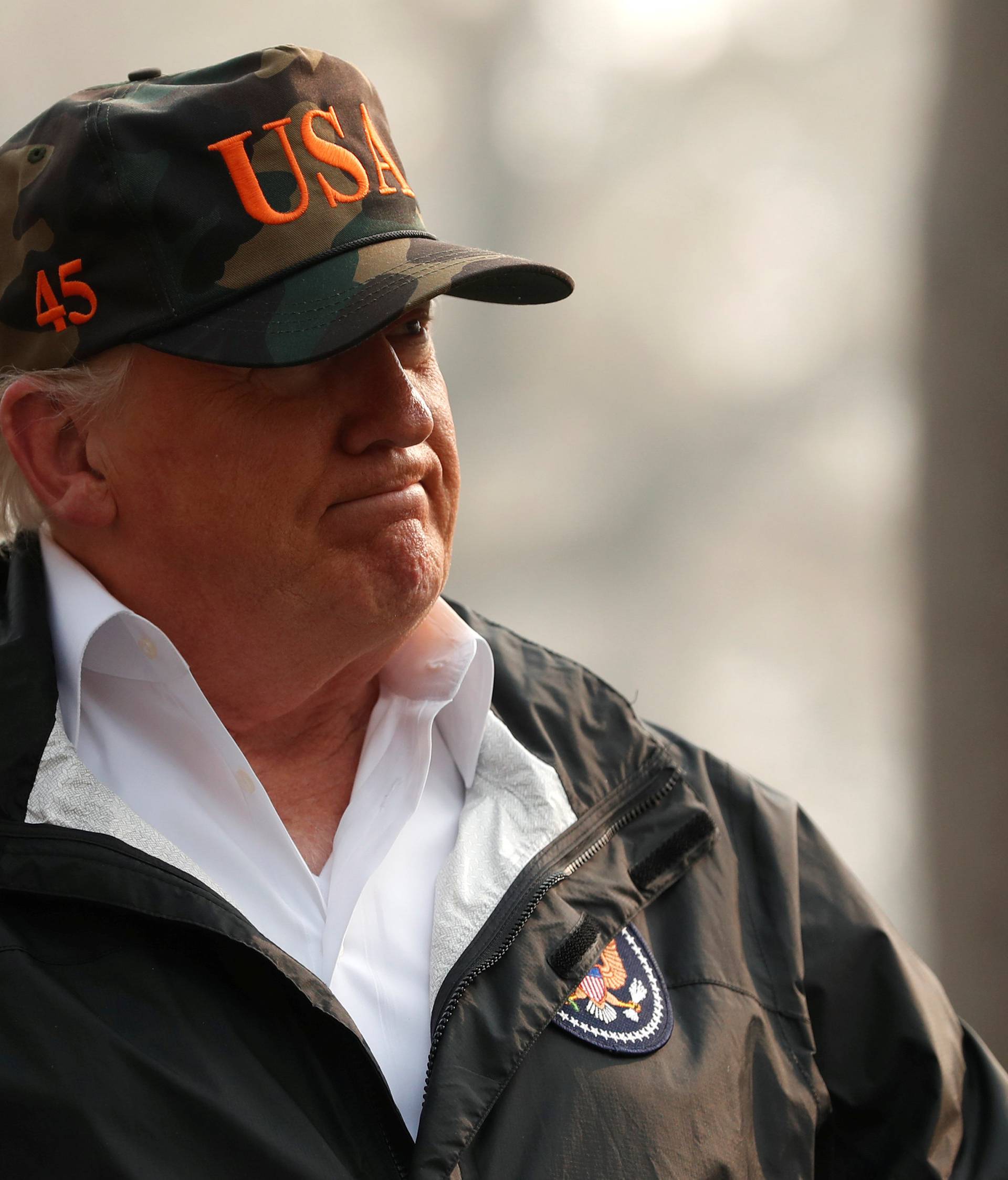 U.S. President Donald Trump visits a neighborhood recently destroyed by the Camp Fire in Paradise, California, U.S.