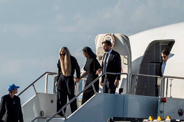 FILE PHOTO: The body of slain conservative activist Charlie Kirk is transported aboard Air Force Two
