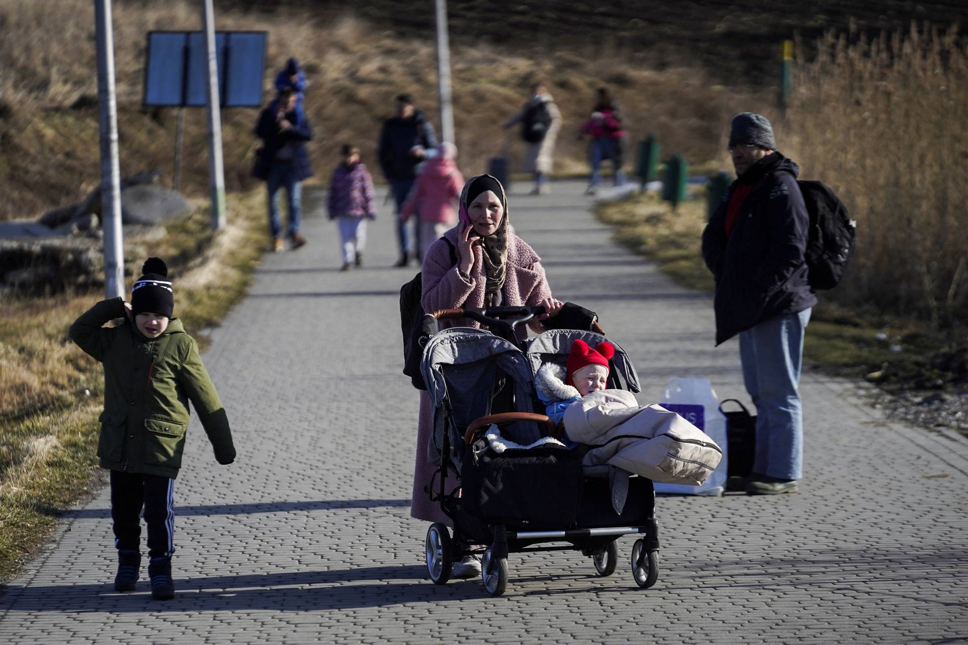 People arrive in Poland after fleeing Ukraine