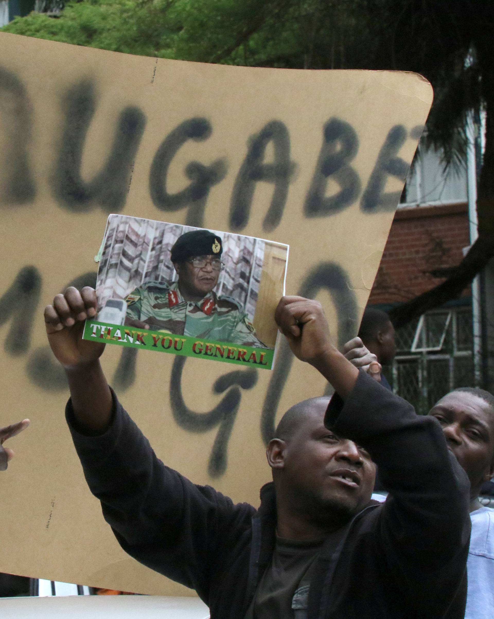 Protesters calling for Zimbabwean President Robert Mugabe to step down take to the streets in Harare
