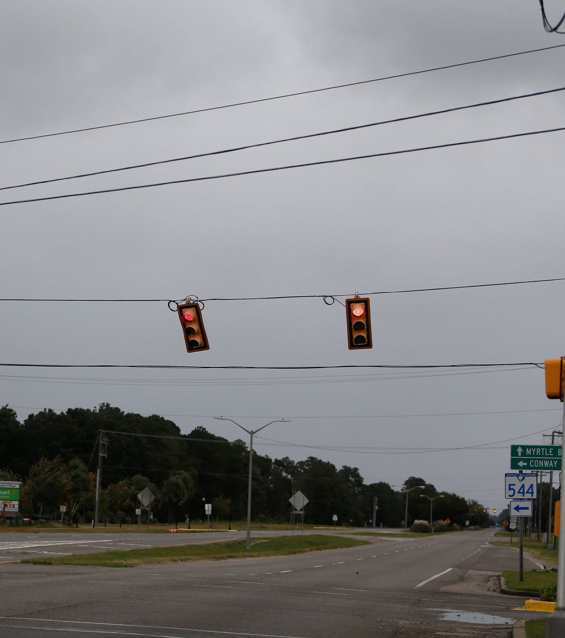 Traffic signals blow in the wind during Hurricane Florence in Surfside Beach