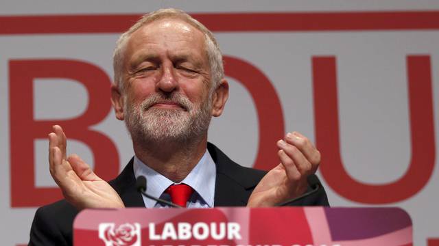 The leader of Britain's opposition Labour Party, Jeremy Corbyn, reacts after the announcement of his victory in the party's leadership election, in Liverpool