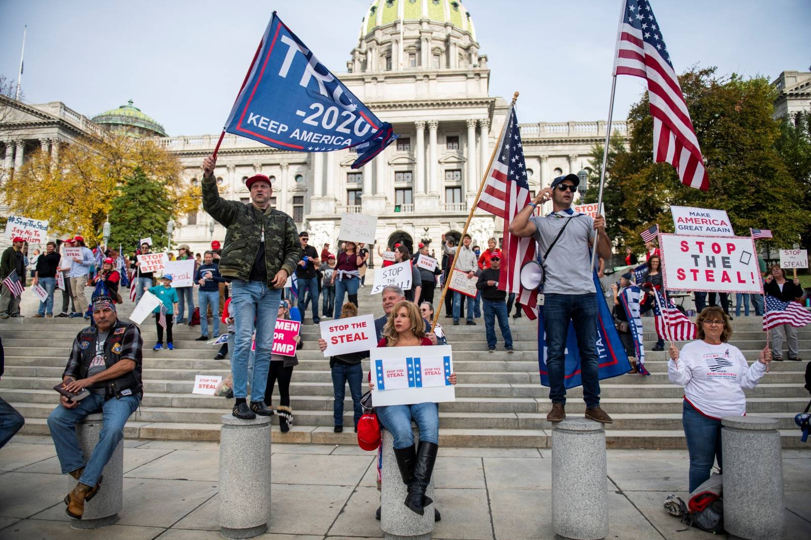 Supporters of U.S. President Donald Trump protest in front of the Pennsylvania Commonwealth capitol building in Harrisburg