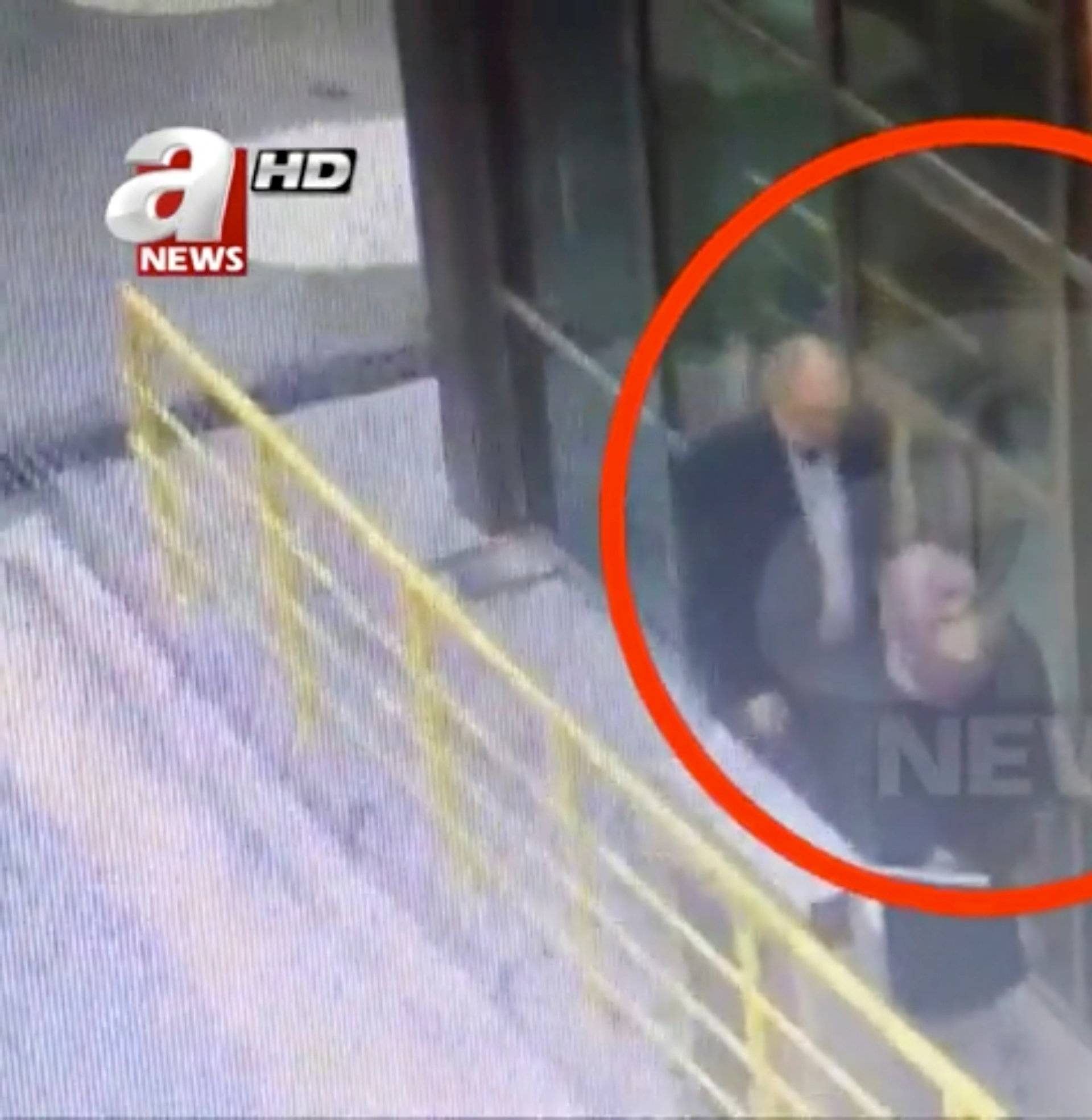 Still image taken from CCTV video purports to show Khashoggi and his fiancee going to Saudi consulate