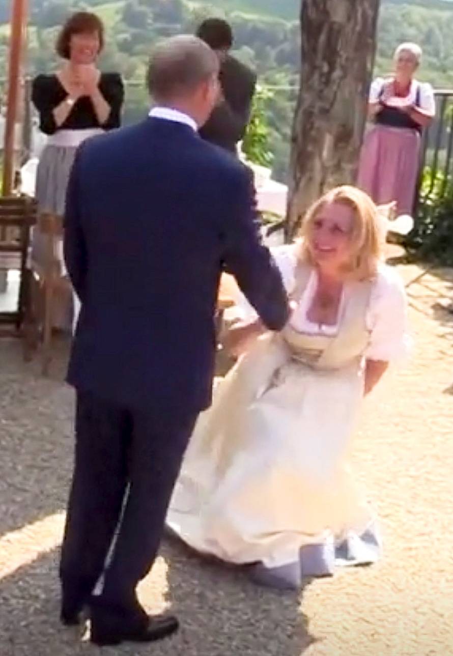 Austria's Foreign Minister Kneissl dances with Russia's President Putin at her wedding in Gamlitz