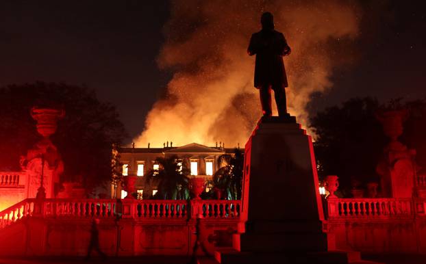 Firefighters try to extinguish a fire at the National Museum of Brazil in Rio de Janeiro