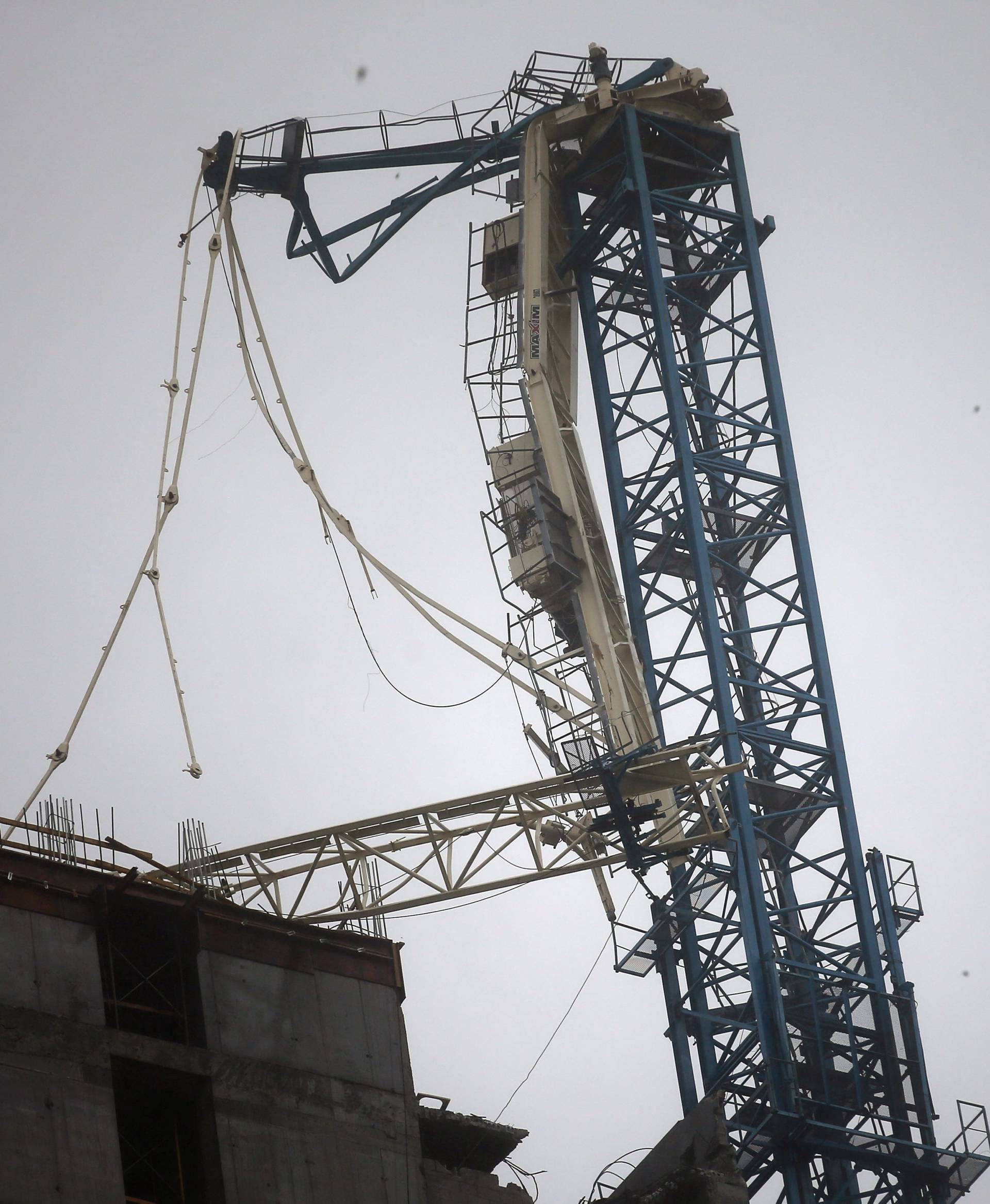 A collapsed construction crane is seen in Downtown Miami as Hurricane Irma arrives at south Florida