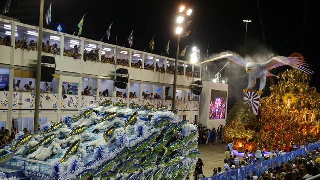 Revellers from Portela samba school perform during the second night of the carnival parade at the Sambadrome in Rio de Janeiro