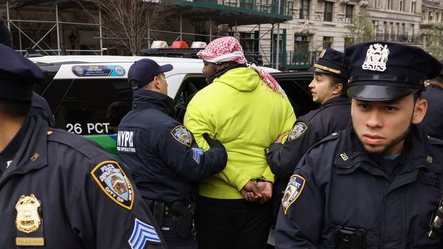 Demonstrators protest in solidarity with Pro-Palestinian organizers on the Columbia University campus, in New York City