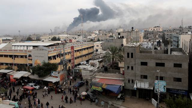 Smoke rises after Israeli strikes, in Khan Younis