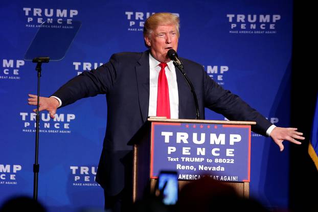 Republican presidential nominee Donald Trump discusses a security incident, where he was hustled off the stage by security agents, during a campaign rally in Reno, Nevada