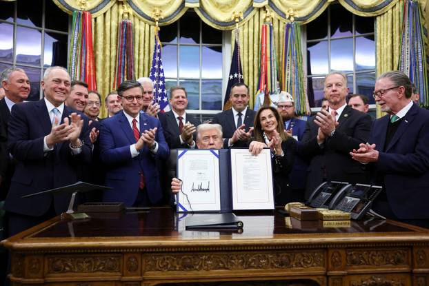 U.S. President Trump signs the funding bill to end the government shutdown, in Washington, D.C.