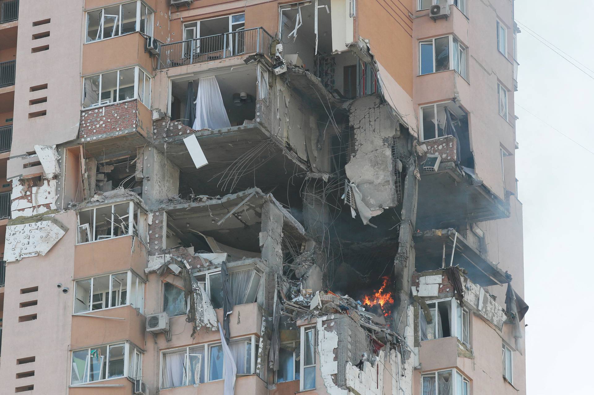 A view shows an apartment building damaged by recent shelling in Kyiv