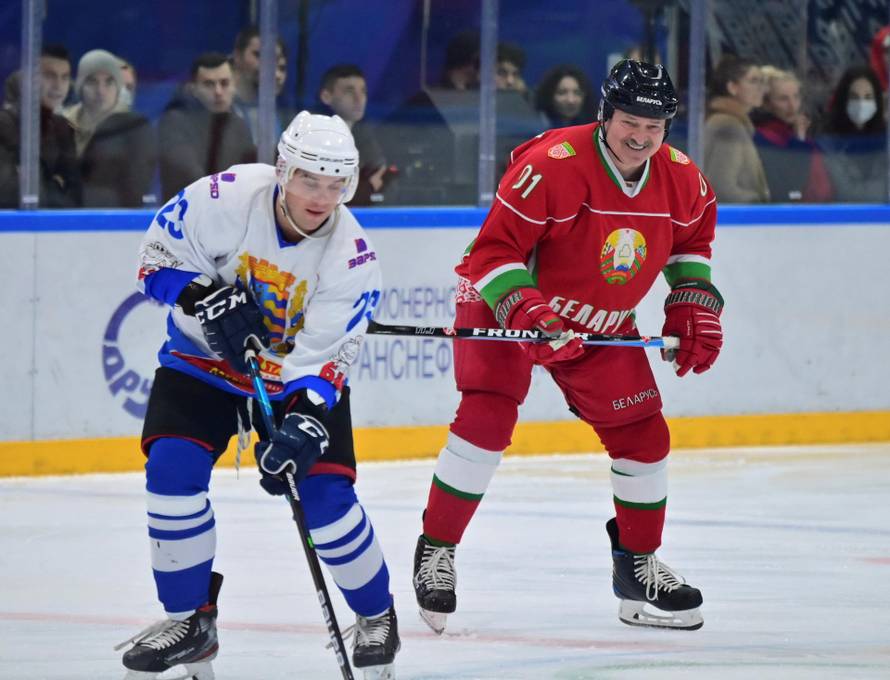Belarusian President Alexander Lukashenko takes part in a hockey match