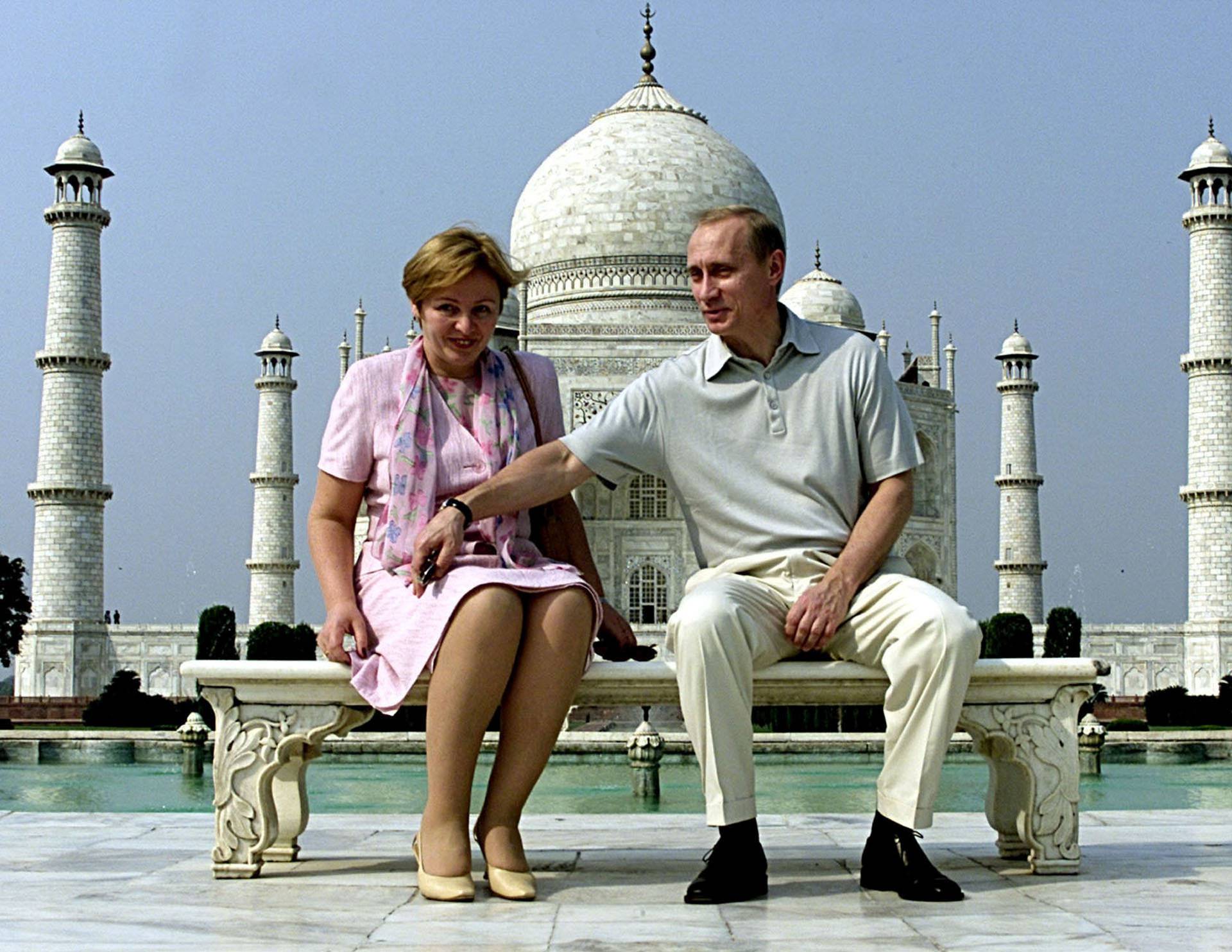 FILE PHOTO: Putin and his wife Lyudmila sit in front of the Taj Mahal while touring Agra
