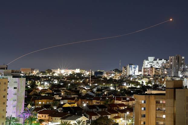 Israel's Iron Dome anti-missile system intercepts a rocket launched from the Gaza Strip, as seen from Ashkelon