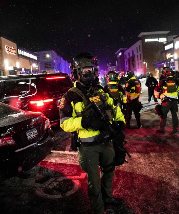Protest outside the hotel where Bovino, who has been removed from his role, is reportedly staying, in Maple Grove