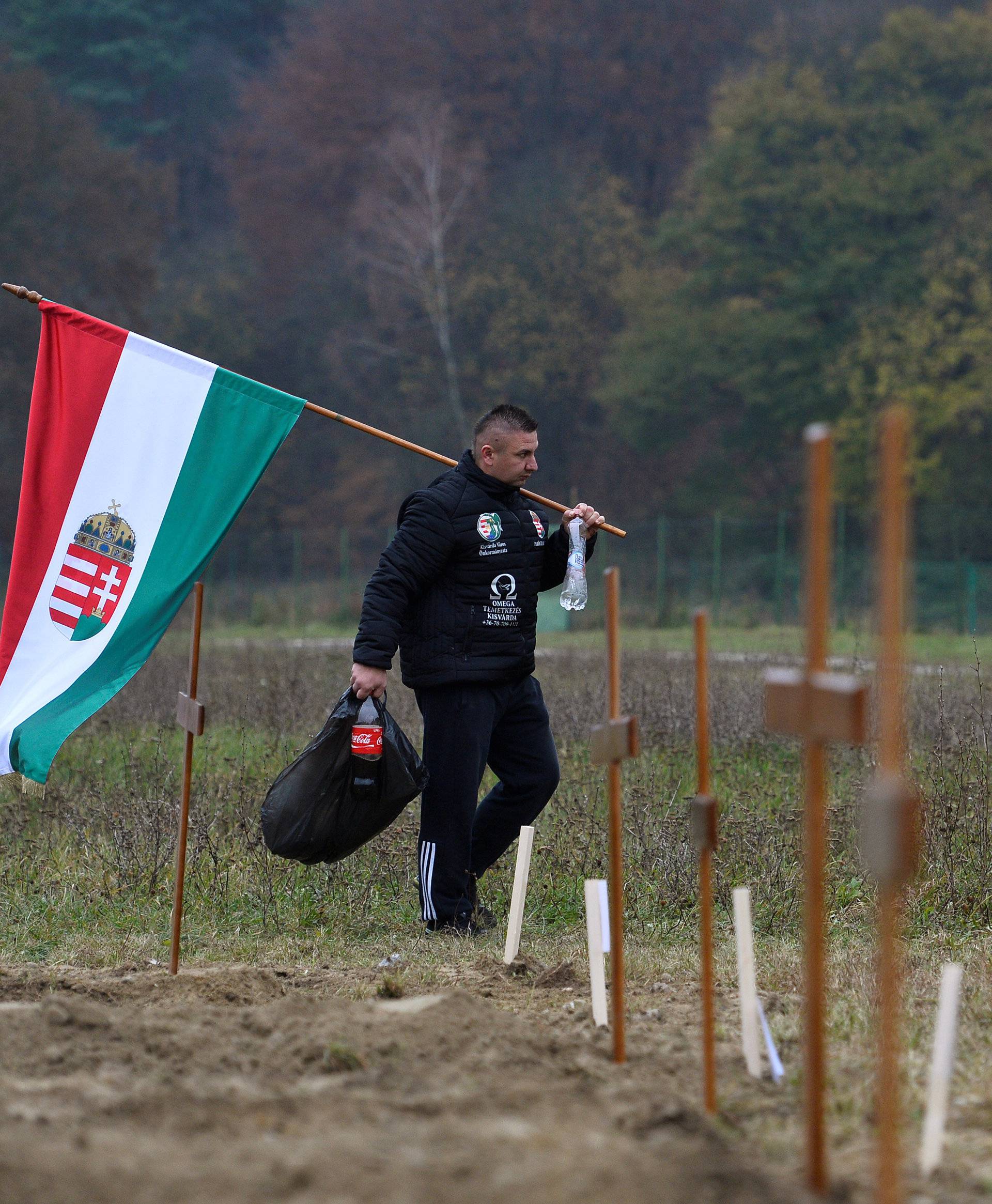 A Hungarian gravedigger finishes his work during a grave digging championship in Trencin, Slovakia