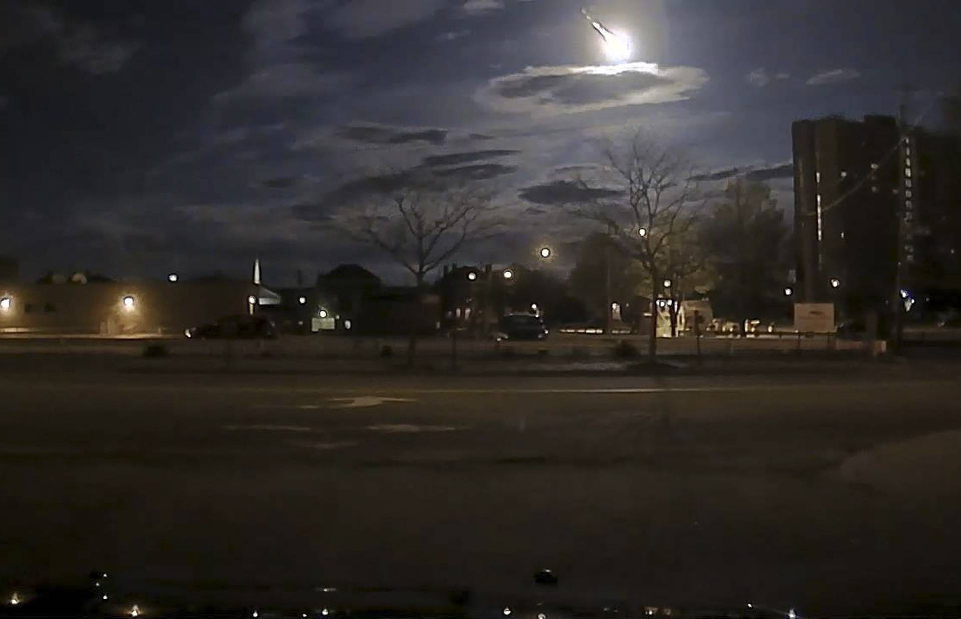 Portland Maine Police Department image of a meteor streaking across the sky early morning in Portland Maine