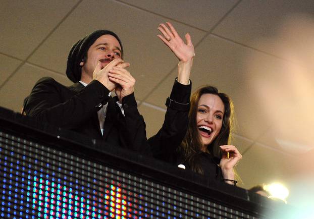 Angelina Jolie and Brad Pitt at Superbowl - Miami